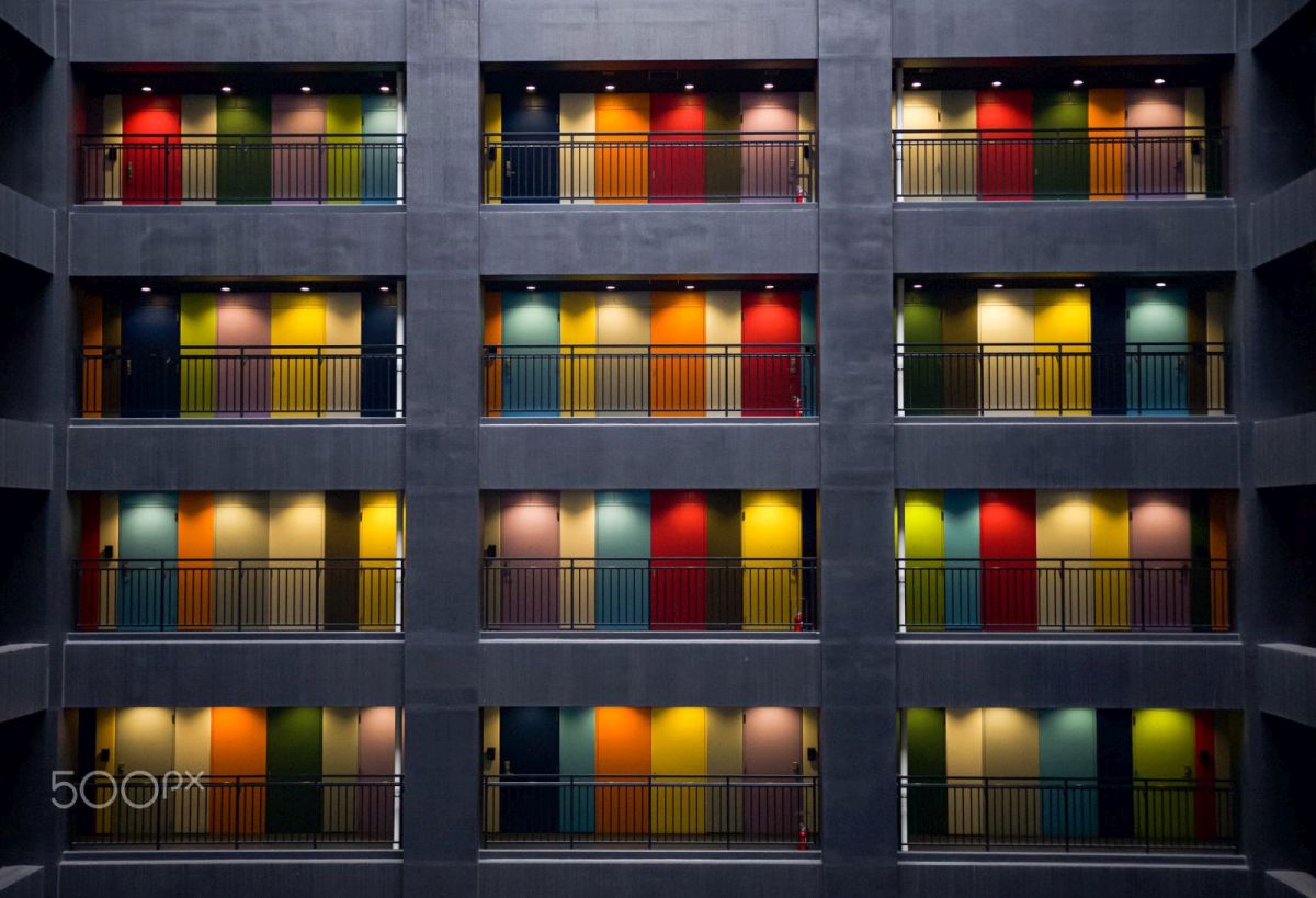 best colourful building photo rainbow doors by adi perets