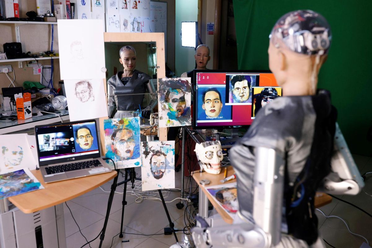 robot sophia painting self portrait